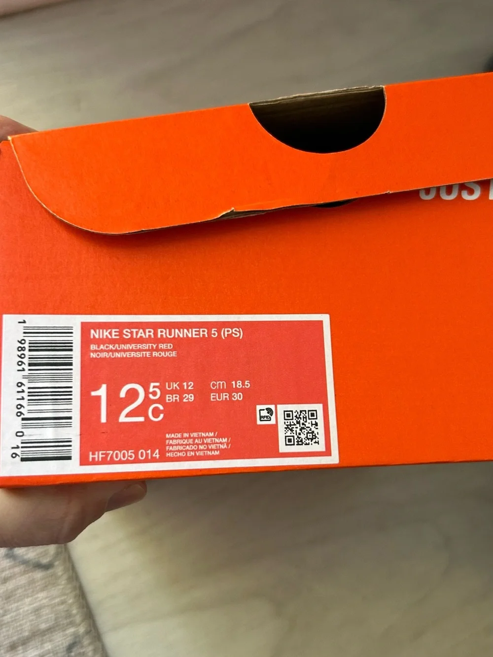 Nike Kids Black Sneakers with Red Accents